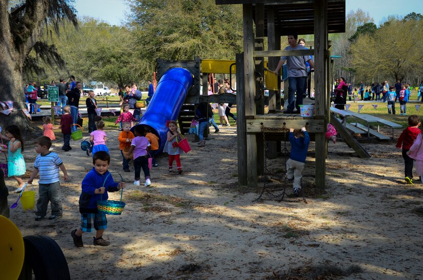 Children search for eggs during the Easter Egg Hunt at the annual Easter Event March 30, 2013, at Marrington Plantation on Joint Base Charleston – Weapons Station, S.C. More than 500 participants attended this year’s event, according to Robert Veronee, JB Charleston – Weapons Station Youth Center coordinator. (U.S. Air Force photo/Staff Sgt. Anthony Hyatt)