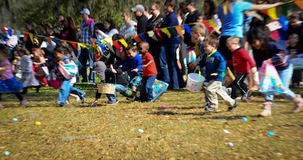 Children sprint to grab eggs during the annual Easter Event March 30, 2013, at Marrington Plantation on Joint Base Charleston – Weapons Station, S.C. This year’s event included an Easter Egg Hunt, face painting stations and refreshments. (U.S. Air Force photo/Staff Sgt. Anthony Hyatt)