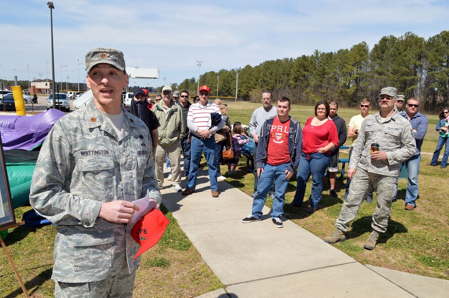 Maj. Joseph Whittington, 3rd Aerial Port Squadron commander, addresses squadron personnel and family members during a picnic March 29, 2013, celebrating the squadron's 60th anniversary March 16, 2013, at Pope Army Airfield, Fort Bragg, N.C. (Courtesy photo)


