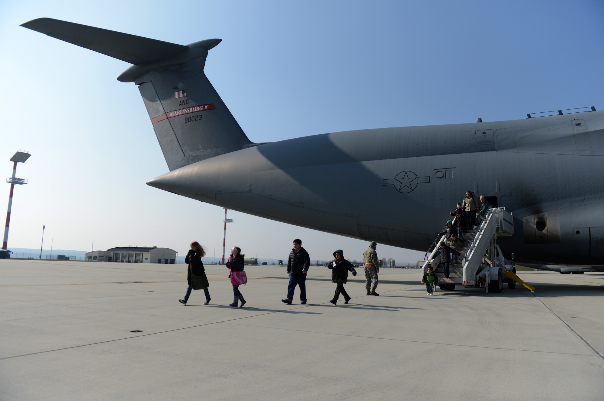 Children from the Spangdahlem and Bitburg elementary schools tour a U.S. Air Force C-5 Galaxy cargo aircraft at the 726th Air Mobility Squadron during Children’s Deployment Day March 28, 2013. More than 600 students participated in the three-day event hosted by the 52nd Logistics Readiness Squadron. Numerous wing agencies came together at the 52nd LRS Installation Deployment Readiness Cell to show the students the process their parents go through when preparing for deployments. (U.S. Air Force photo by Airman 1st Class Gustavo Castillo/Released)