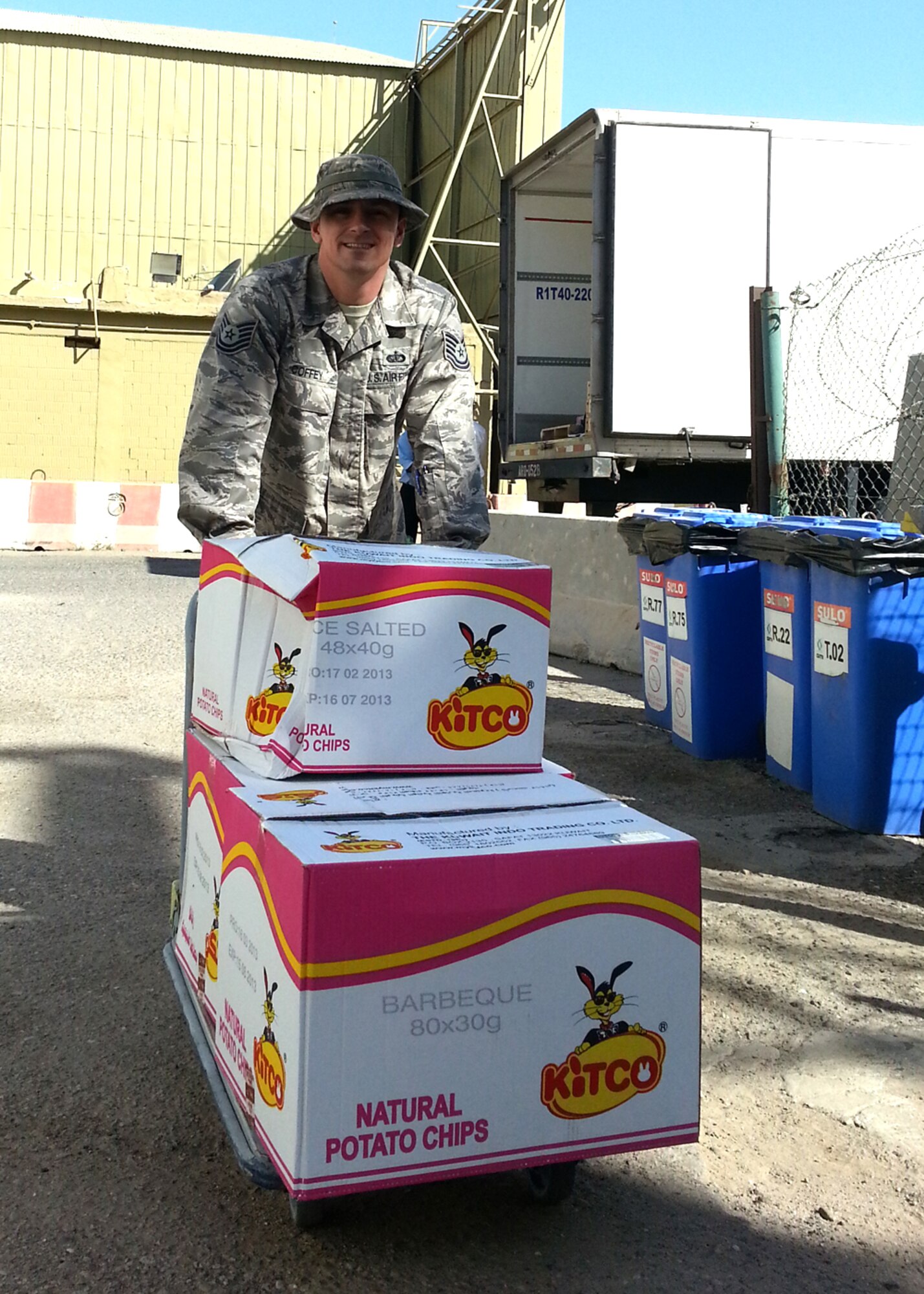 Tech. Sgt. Timothy Coffey, 386th Expeditionary Force Support Squadron, Noncommissioned Officer transports food to the dining facility at 'The Rock' here April 3.
