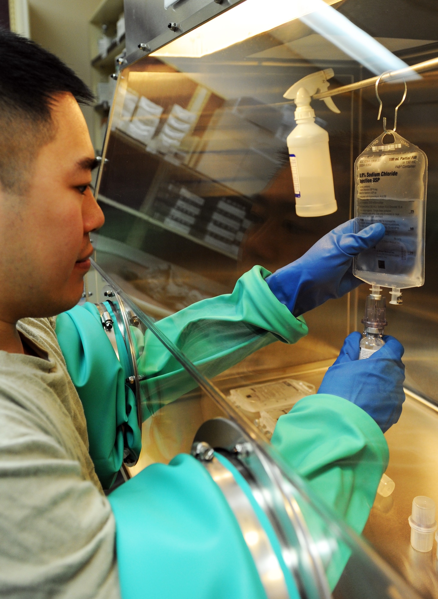 U.S. Air Force Capt. David Vuong, 35th Medical Support Squadron staff pharmacist, prepares IV antibiotics at Misawa Air Base, Japan, April 2, 2013. The pharmacy fills an average of 200 prescriptions a day. (U.S. Air Force photo by Airman 1st Class Kia Atkins)