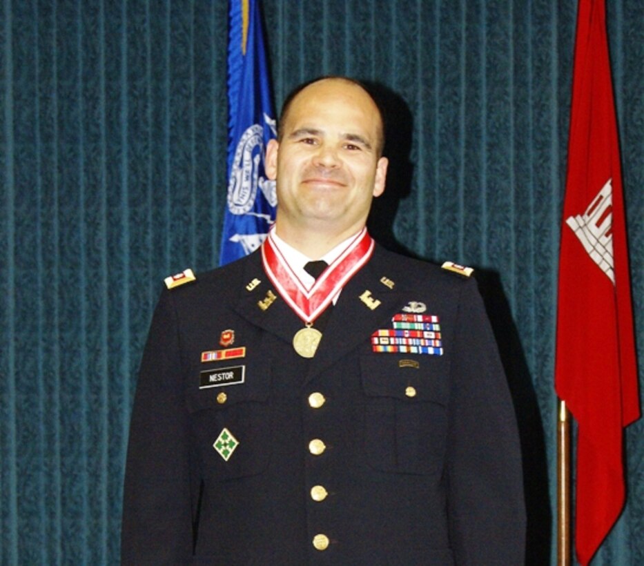 Lt. Col. Don Nestor wearing the prestigious Bronze de Fleury Medal around his neck. The medal recognizes Nestor’s superior service to the Army Engineer Regiment in support of the Army mission.