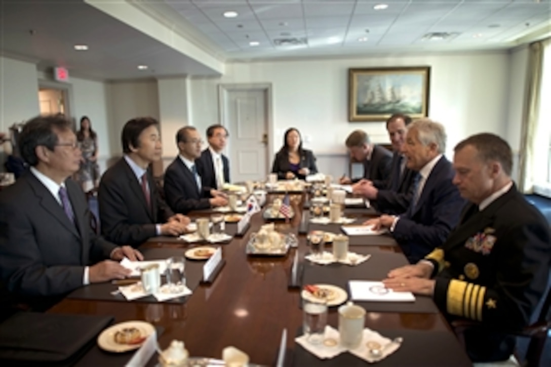 Secretary of Defense Chuck Hagel, second from right, meets with Republic of Korea Minister of Foreign Affairs Yun Byung-se, second from left, in the Pentagon on April 3, 2013.  Hagel congratulated Byung-se on his appointment as foreign minister and expressed the unwavering American commitment to our alliance with the Republic of Korea.  