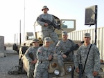 Five members of Cathy Hammack's family are serving in Iraq. Her husband, two sons, brother-in-law and son-in-law all are serving with the 111th Engineer Brigade. They are Sgt. Maj. Keith Hammack, husband (second from right); Capt. Keith Hammack, Jr. , son (second from left); Spc. Casey Hammack, son (top); Sgt. Roy Hammack, brother-in-law(right), and Sgt. Casey Phalen, son-in-law (left).