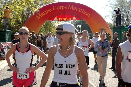 Utah National Guard member and the 2007 Miss Utah Sgt. Jill Stevens smiles after crossing the finish line at the Marine Corps Marathon in Washington Oct. 28.