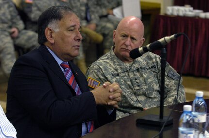 Yona Yahav, mayor of Haifa, Israel, briefs LTG H Steven Blum, the chief of the National Guard Bureau, about how his city responded to the 2006 Lebanon War. National Guard Bureau officials visited Haifa in early December to learn how the city coped with a 34-day missile bombardment.