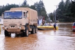 Nearly 500 Washington State Army and Air National Guardmembers were activated in early December and worked to restore power and ensure safe travel around flooded roads, among other duties. The Guard mobilized with about 75 vehicles that could get through many of the flooded areas that regular vehicles could not.