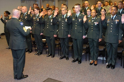 Army National Guard Readiness Center 1st Sgt. James Moore leads 37 sergeants and staff sergeants through the Noncommissioned Officers Charge during a Jan. 16 induction ceremony at the center in Arlington, Va. Army Guard officials said the center's first Noncommissioned Officers Induction Ceremony officially recognized the NCOs as members of the NCO Corps.