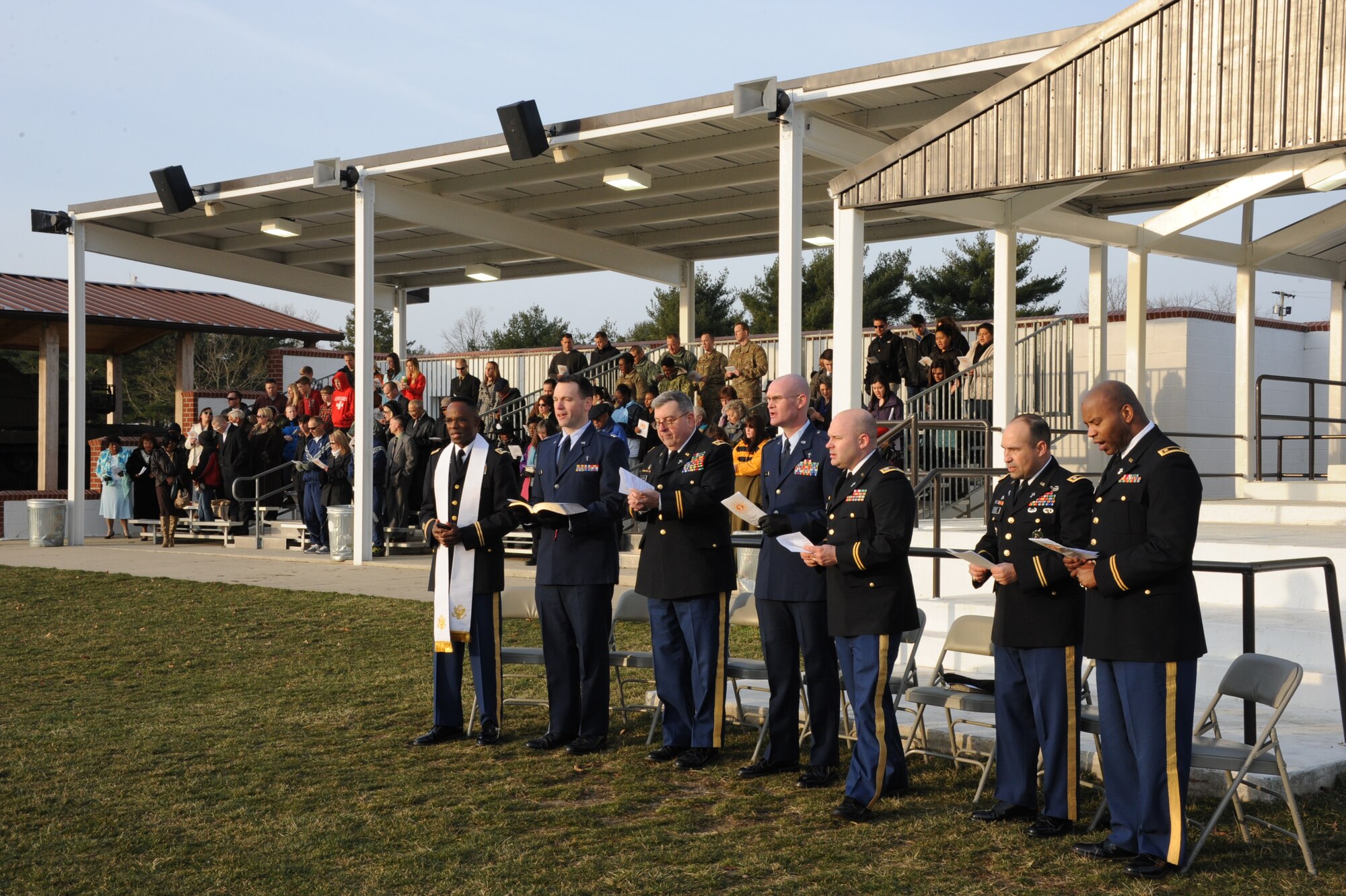 Joint base chaplains sing hyms during the Protestant Easter Sunrise Service on Doughboy Field at Joint Base McGuire-Dix-Lakehurst, N.J., March, 31, 2013. The service, which commemorates the resurrection of christ, included a special performance from the Friendship Ame Church of Browns Mills, N.J. (U.S. Air Force photo by Airman Sean M. Crowe/Released)