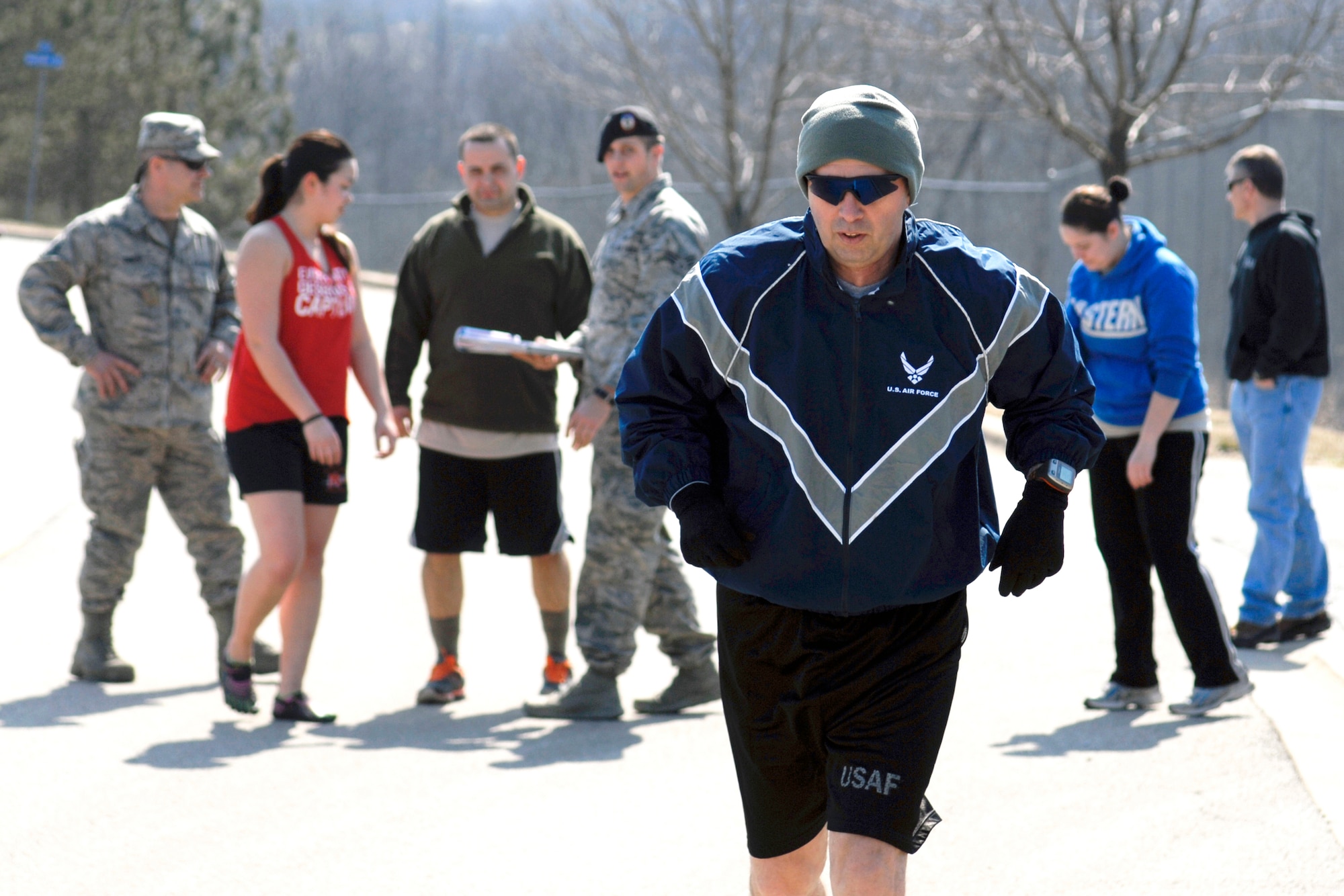 U.S. Air Force Lt. Col. William Wheeler leads as the first runner of the Tactical Air Control Party Association 24 Hour Run Challenge at the 182nd Airlift Wing in Peoria, Ill., March 28, 2013.  Sixty-two runners ran 161.75 miles around the installation over the course of 24 hours and raised over $8,200 in support of the TACP community and their families.  The 182nd team also ran in remembrance of Staff Sgt. Jacob Frazier, a member of the Peoria-based 169th Air Support Operations Squadron who was killed in action near Geresk, Afghanistan, 10 years earlier on March 29, 2003.    (U.S. Air Force photo by Staff Sgt. Lealan Buehrer//Released)