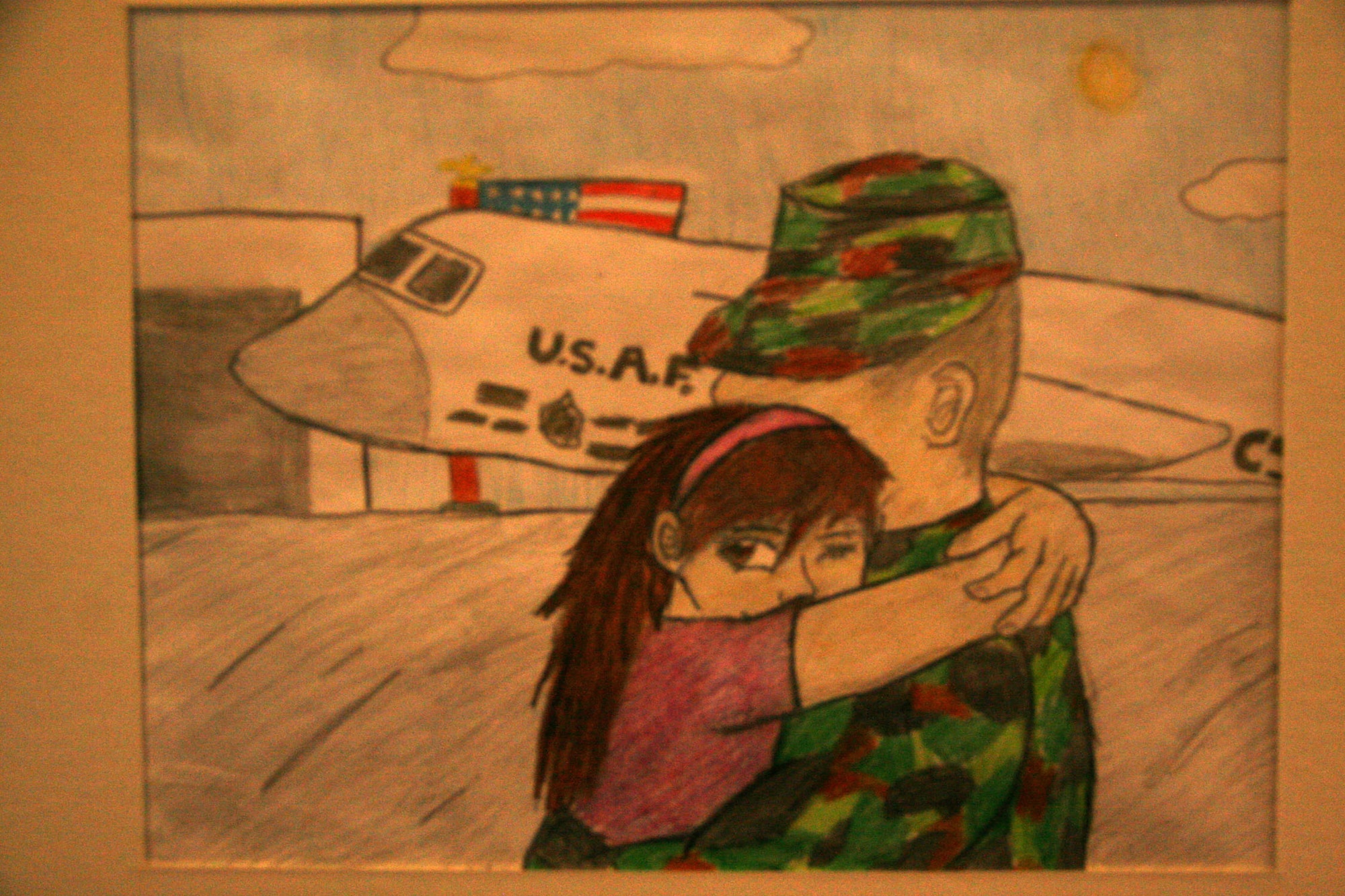 Lauren Sink, a high school junior, drew this picture of her Army father returning home. Nearly 50 illustrations, paintings and writings were on display at the U.S. Education Department on April 3, 2013, in observance of the Month of the Military Child. (Department of Defense photo by Terri Moon Cronk)