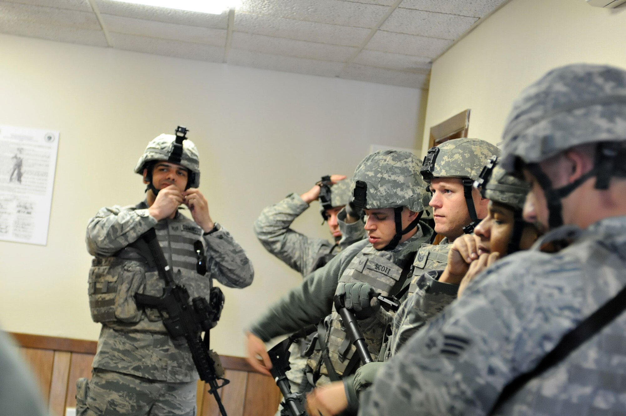 Members of the 102nd Security Forces Squadron perform a week of training which included weapons training, simulation training, using night vision equipment, and performed various physical fitness competitions throughout the week.(National Guard photo by Tech. Sgt. Kerri Cole/Released)