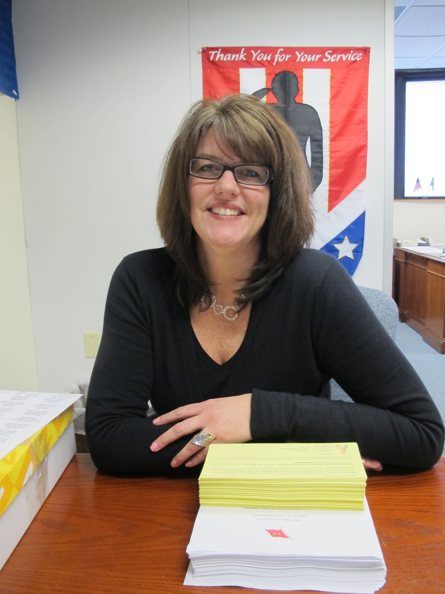 NEW CASTLE AIR NATIONAL GUARD BASE, Del.: Christine Kubik, employer support specialist for the Soldiers, Airmen and families of the Delaware National Guard, in Delaware Air National Guard HQ on March 13, 2013, where she works each Wednesday. Enter the main lobby, and her office door is just steps away to the right. (Air National Guard photo/Tech. Sgt. Benjamin Matwey)