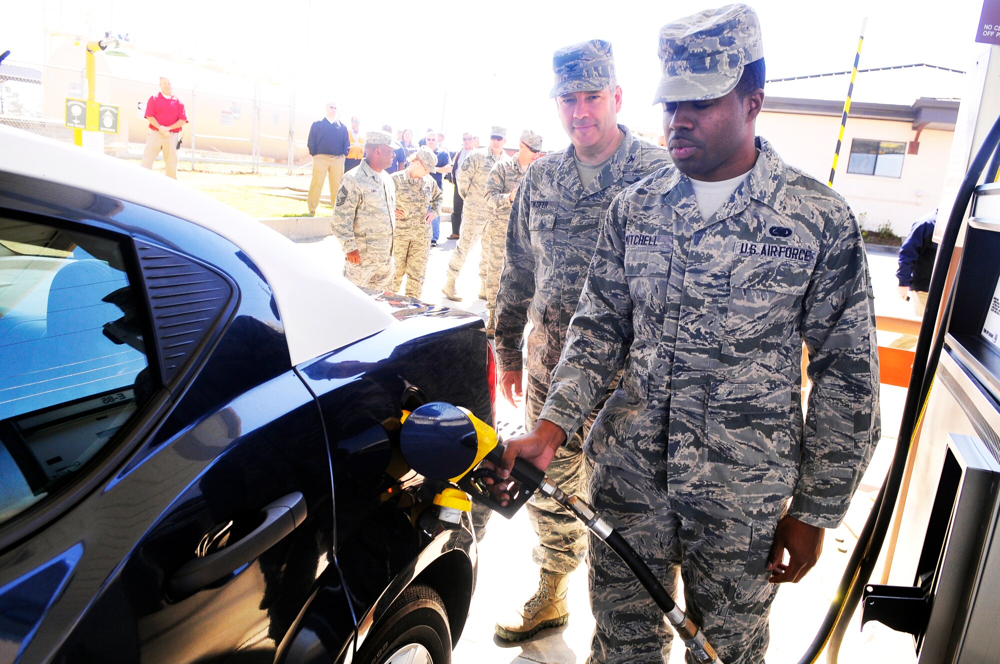 Airman 1st Class Billy Mitchell, 78th Logistics Readiness Squadron fuels journeyman, conducts the ceremonial first fueling of the new E-85 tank. Col. Mitch Butikofer, 78th Air Base Wing commander, visited the LRS fuels flight for the ceremony where 115 alternate fuel vehicles on base will be able to be fueled with E-85. 

The ceremony was symbolic of the long-awaited selfservice E-85 issue tank that will save vehicle operators all over base time, gas and significantly reduce accident possibilities as operators will not have to go off base to receive E-85. ( U. S. Air Force photo by Sue Sapp/Released)