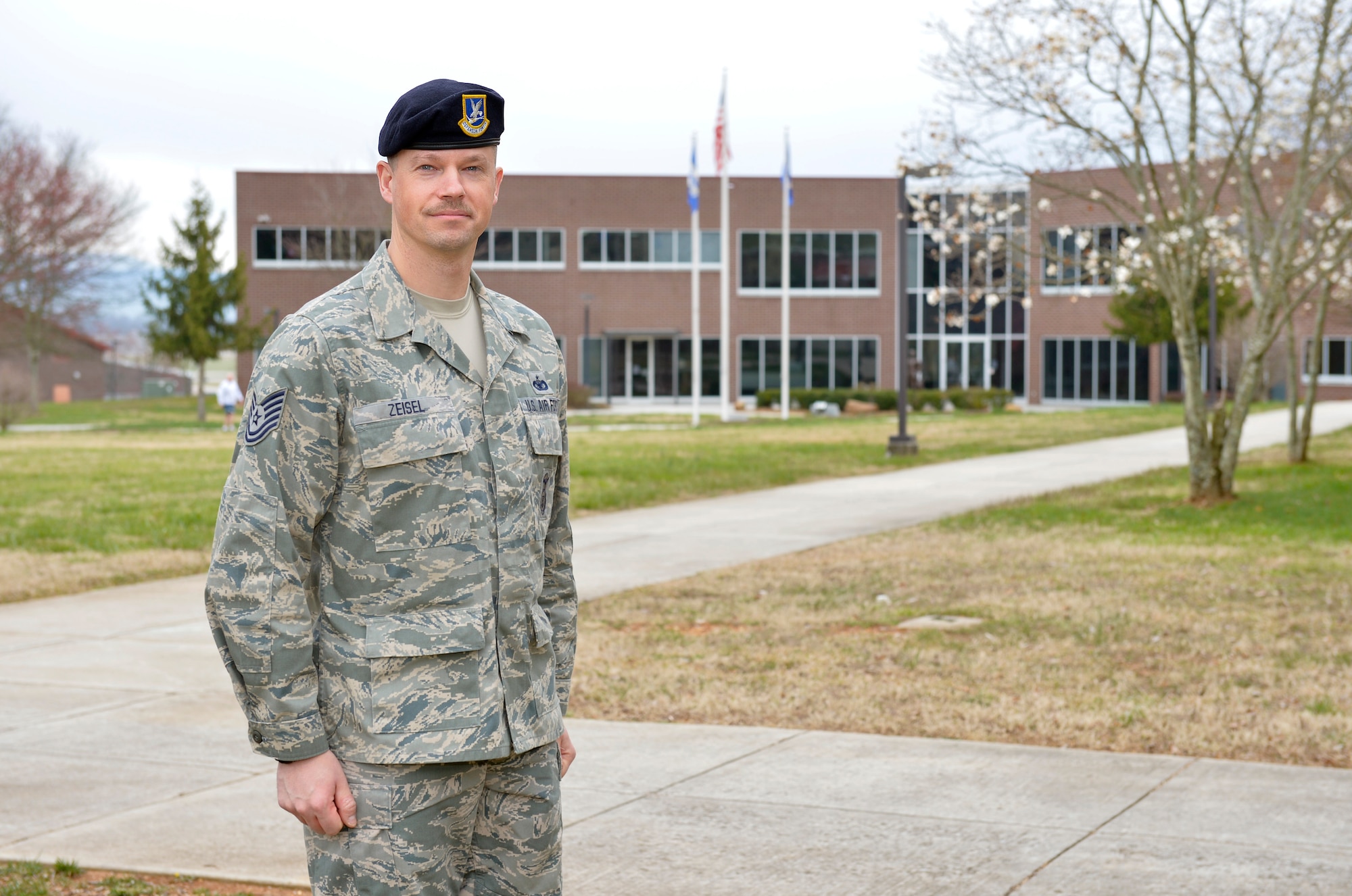 Tech. Sgt. Brian Zeisel recently graduated from the NCO academy April 4, 2013, at McGhee Tyson Air National Guard Base, Ten. Zeisel is a full-time Alaska State Trooper who appears on the National Geographic Channel with his K9 partner “Argo.” Zeisel is assigned to the Alaska Air National Guard’s 168th Security Forces Squadron at Eielson Air Force Base. (National Guard photo/ Master Sgt. Kurt Skoglund)
