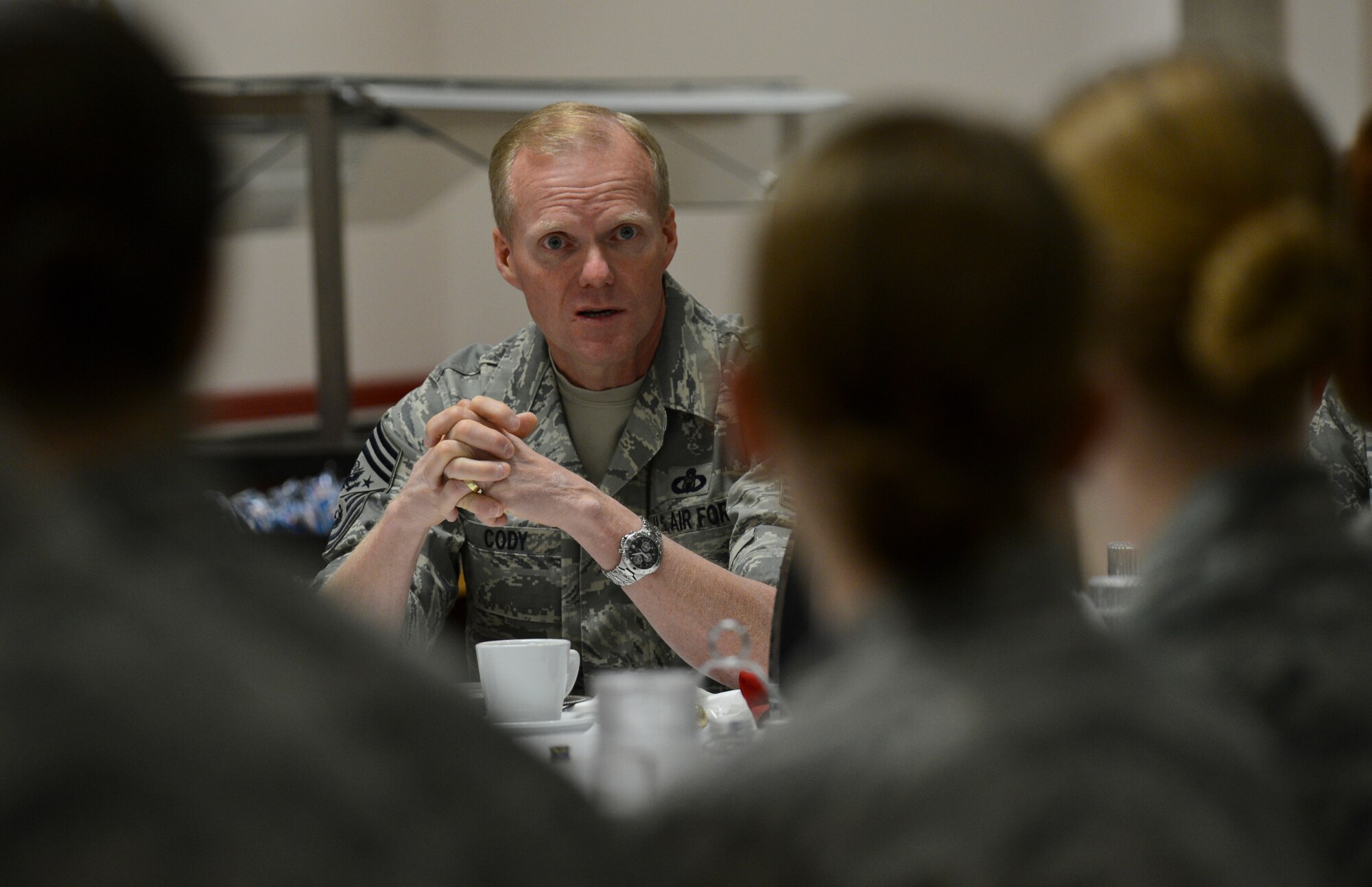 Chief Master Sgt. of the Air Force James A. Cody speaks with Airmen about the Tuition Assistance Program during a breakfast at the Red River Dining Facility on Barksdale Air Force Base, La., April 3, 2013. The CMSAF visited Barksdale along with the Air Force Chief of Staff Gen. Mark A. Welsh III where they shared their views on the challenges and opportunities facing today's Airmen. (U.S. Air Force photo/Senior Airman Micaiah Anthony)