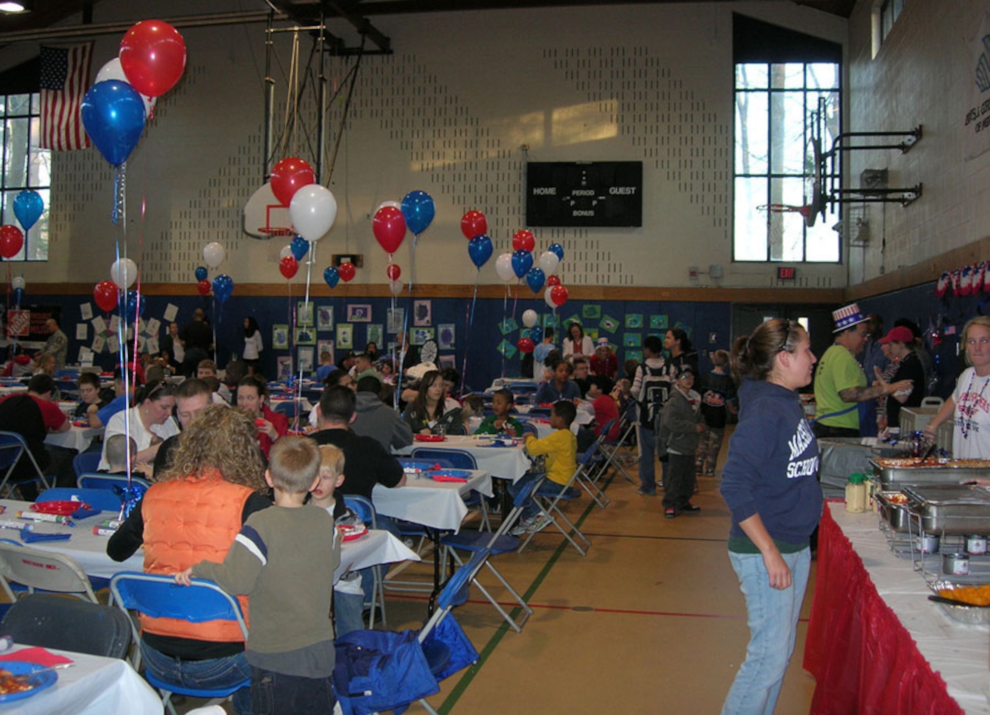 HANSCOM AIR FORCE BASE, Mass. – A large crowd gathers at the Youth Center for Pasta Night March 28. The annual event kicks off Month of the Military Child activities. (Courtesy photo)