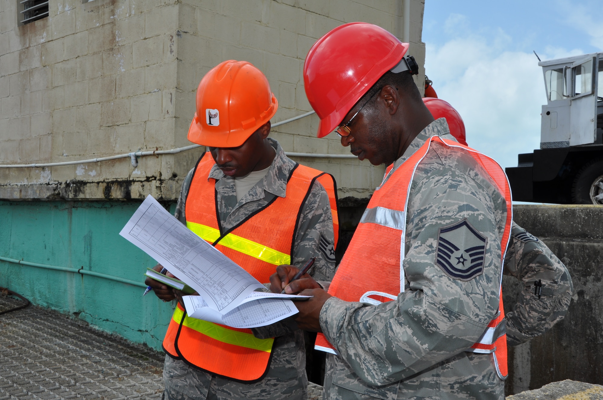 Master Sgt. Wilbert Hall, right, logistics superintendent assigned to the 823rd RED HORSE Squadron, and Staff Sgt. Tori Wynn, left, supply journeyman assigned to the 823rd RED HORSE Squadron, account for items that arrived at the port of Belize April 2, 2013, on the U.S. Army Vessel Brandy Station. The containers were filled with supplies for New Horizons, a U.S. Southern Command exercise providing medical and dental treatment as well as constructs needed structures, such as classrooms, throughout Belize. (U.S. Air Force photo/Capt. Holly Hess)