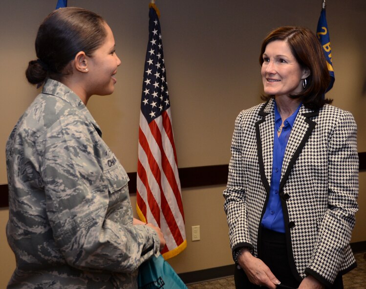 1st Lt. Kathleen Chatara, Victim's Advocate and Sexual Assault Response Coordinator alternate, speaks with Betty Welsh, wife of Air Force Chief of Staff Gen. Mark A. Welsh III, about the promotion of Sexual Assault Awareness Month during a briefing at the 2nd Medical Group on Barksdale Air Force Base, La., April 2, 2013. (U.S. Air Force photo/Staff Sgt. Amber Ashcraft)