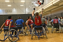 Larry Franklin, a player on the Air Force wheelchair basketball team, takes a shot during a scrimmage at the Rambler Fitness Center March 22, at Joint Base San Antonio-Randolph (U.S. Air Force photo by Benjamin Faske) (released)