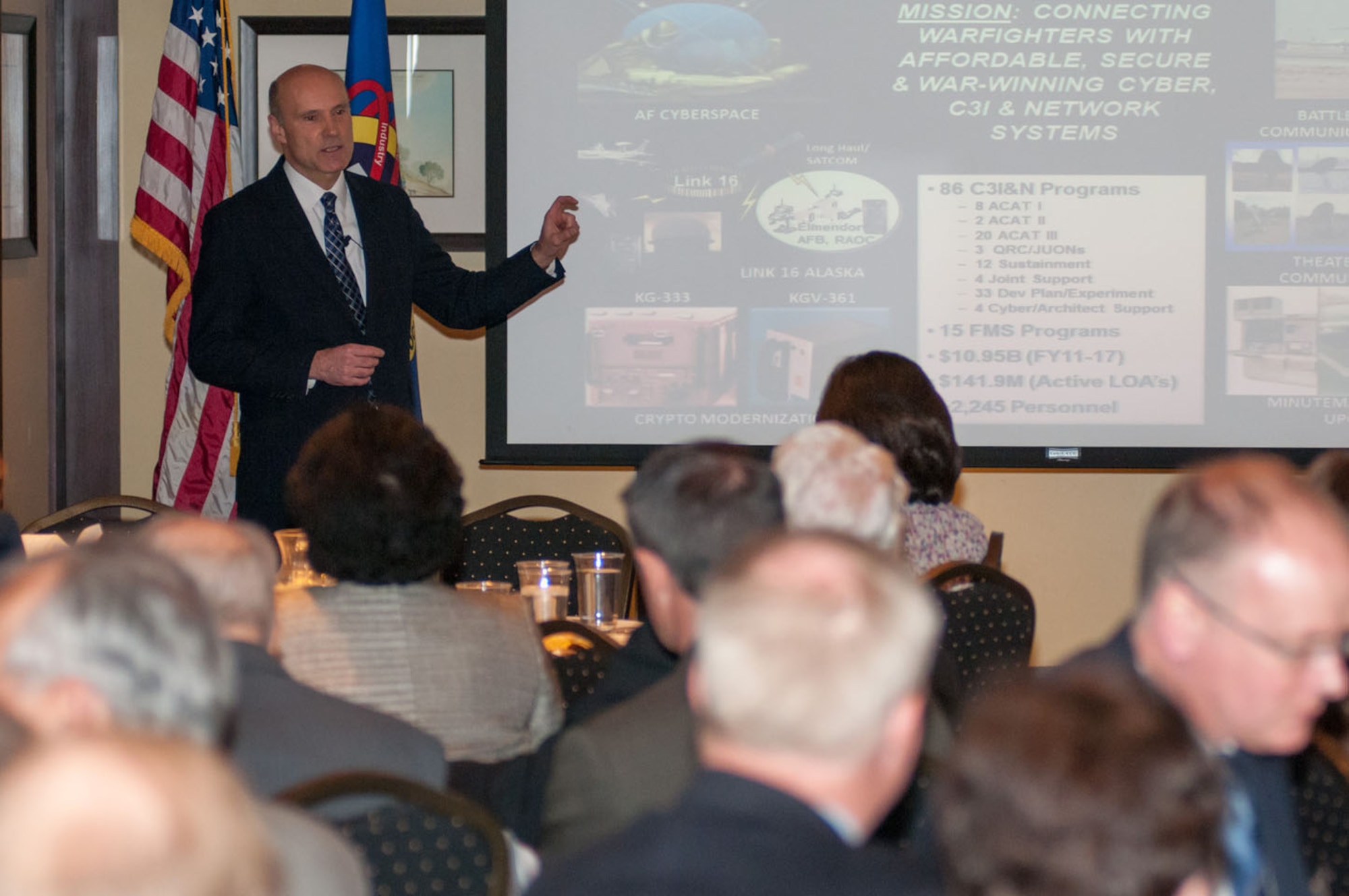 LEXINGTON, Mass. -- Tom Powis, Program Management organizational senior functional for the C3I and Networks Directorate, briefs members of the Hanscom Representatives Association at Waxy O'Connors March 28. Powis spoke about the directorate’s portfolio and upcoming business opportunities. (U.S. Air Force Photo by Rick Berry)