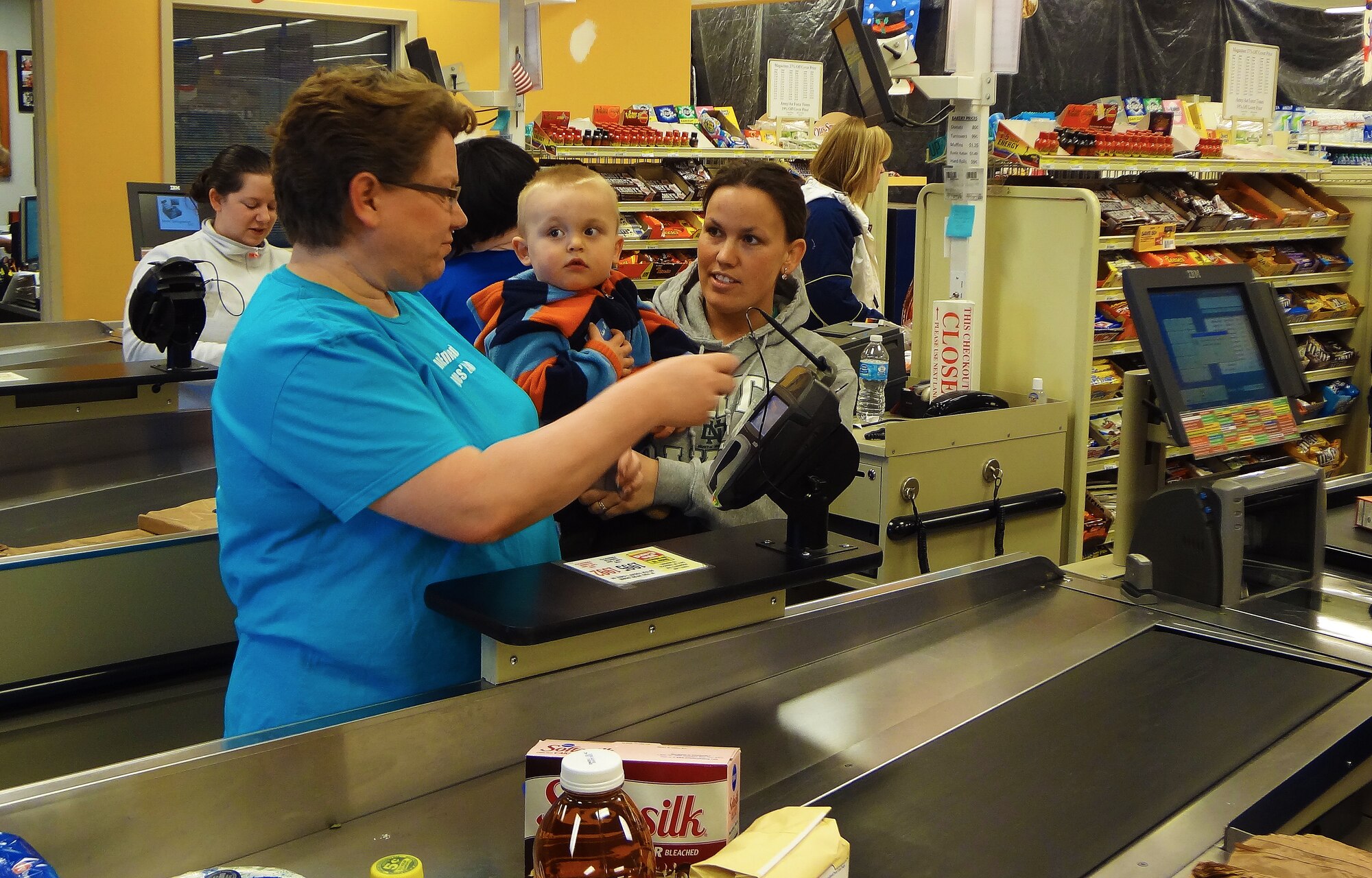 MINOT AIR FORCE BASE, N.D. -- The Minot Enlisted Spouses' Club conducted a commissary gift card giveaway March 30, as one of its many community outreach endeavors. The MESC contribution of $300 towards the grocery expenses of commissary shoppers during the Easter weekend was well received. A number of commissary patrons were further inspired to "pay it forward" by purchasing gift cards for other patrons. For more information about the MESC, please visit www.minotesc.org or  www.facebook.com/minotspouses. (Courtesy photo)