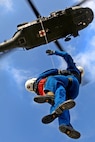 Members of the Texas Task Force 1 Urban Search and Rescue Response System TX-TF1 partners with the Texas Military Forces (TxMF) of the 149th Texas Army National Guard units to form a synergistic and robust aviation response on a UH-60 Blackhawk helicopter. TxMF provides the aviation assets and TX-TF1 provides the rescuers through the Helicopter Search and Rescue Technician program. (U.S. Air Force photo by Joshua Rodriguez/released)
