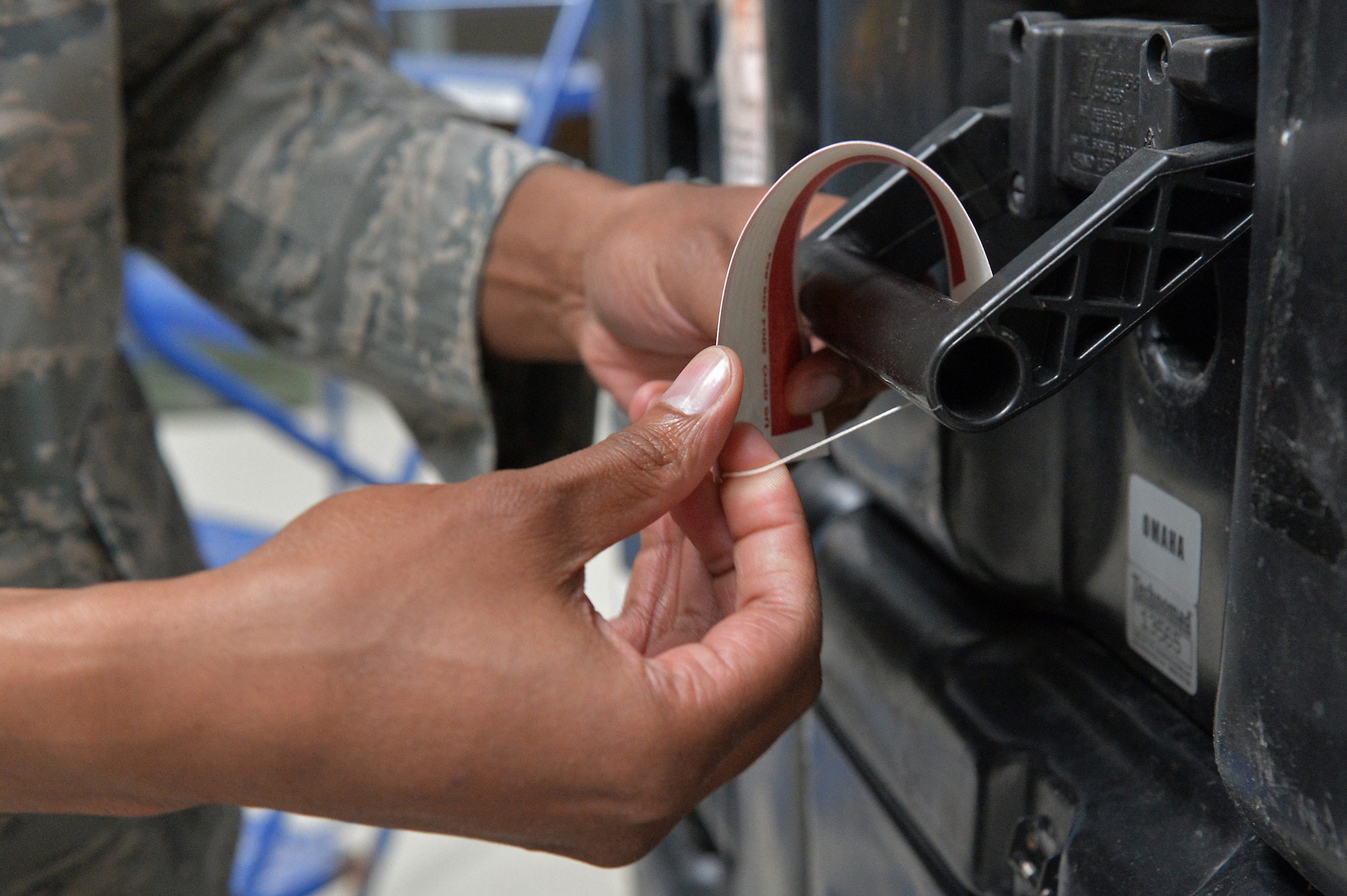 Senior Airman Howard Daniels, 1st Combat Communications Squadron radio frequency transmissions journeyman, tags faulty equipment on Ramstein Air Base, Germany, March 25, 2013. Daniels was recently awarded the Thunderbolt award for his superior achievements and work performance. (U.S. Air Force photo/Airman 1st Class Holly Cook) 