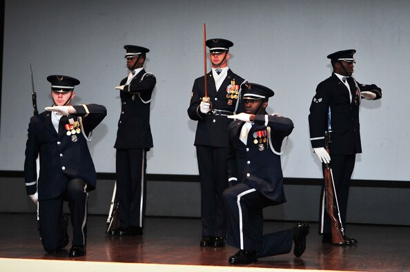 U.S. Air Force Honor Guard Drill Team members perform for Team Seymour during a recruitment brief on Seymour Johnson Air Force Base, N.C., Mar. 28, 2013. The drill team members, selected from the Honor Guard, serve a minimum of two years when assigned to the team. (U.S. Air Force photo by Airman 1st Class Aubrey White/Released)