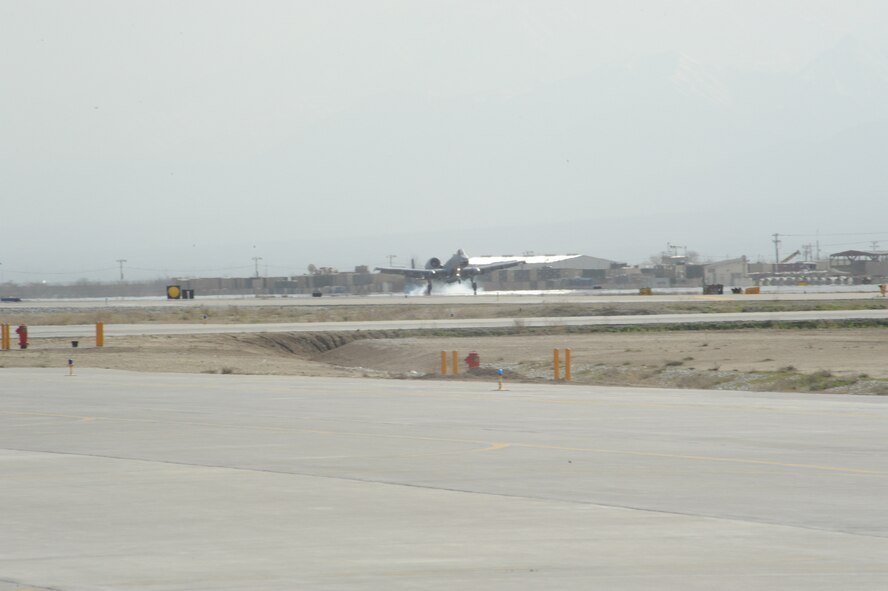 An A-10 Thunderbolt II fighter aircraft touches down on Bagram Airfield, Afghanistan, March 31, 2013. Deployed from the 23rd Fighter Group at Moody Air Force Base, Ga., this aircraft was the first to arrive for the latest deployment rotation. (U.S. Air Force photo/Staff Sgt. David Dobrydney)