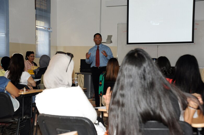 Capt. Carlos Bersabe, 386th Expeditionary Mission Support Group, interacts with students during his lecture at a host nation university, Southwest Asia Apr 3, 2013. Capt. Bersabe was the first person selected under a newly formed U.S. Embassy and 386th Air Expeditionary Wing Public Affairs speakers program in which service members are permitted the opportunity to lecture at host nation universities. (U.S. Air Force photo by Senior Master Sgt. George Thompson)