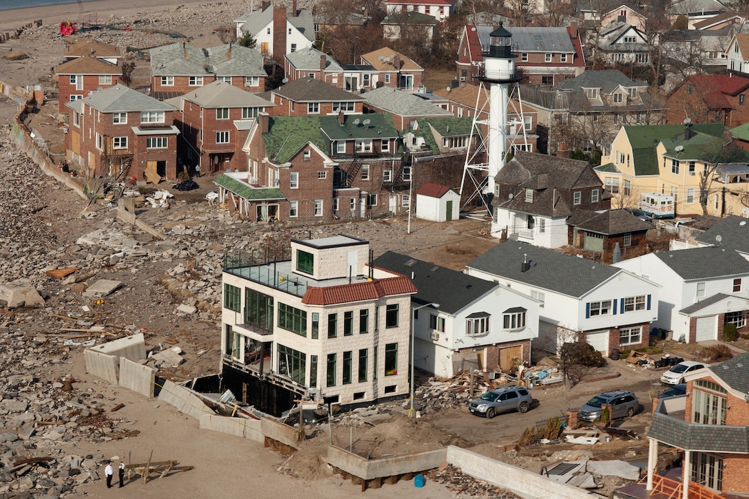 Aerial views of Hurricane Sandy damage along the New York coastline. Following the hurricane, a nor'easter struck the area causing more power outages and additional flooding. (FEMA photo by Andrea Booher)