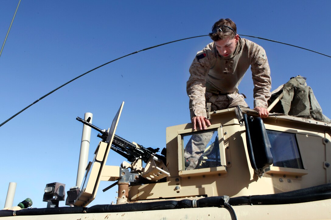 U S Marine Corps Lance Cpl Robert Carroll Organizes The Gun Turret Of