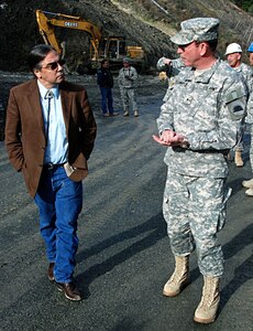 Tribal Chairman Lyle Marshall of the Hoopa Indian Tribe and Brigadier General Kevin G. Ellsworth, Director, Joint Staff California National Guard discuss how the mudslide at Bald Hill completely covered Pine Creek Road, the only route available for many residents going to and from their homes.