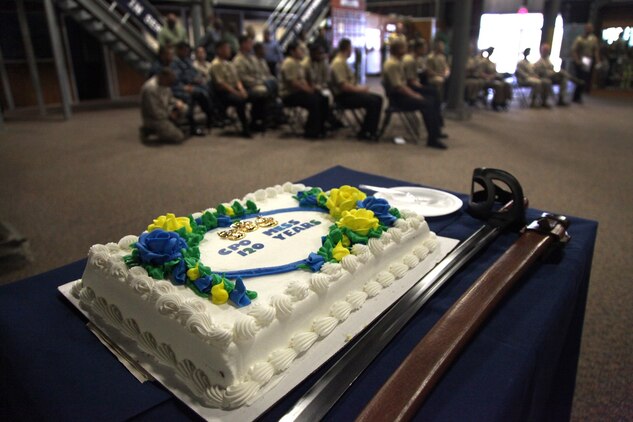 Sailors with 1st Dental Battalion, 1st Marine Logistics Group, prepare for the start of the 120th anniversary of the chief petty officer rating aboard Camp Pendleton, Calif., Monday, April 1, 2013. The cake-cutting ceremony is part of a tradition where the eldest chief petty officer passes a piece of cake to the youngest to symbolize the passing of wisdom and tradition. (U.S. Marine Corps photo by Cpl. Laura Gauna/Realeased)