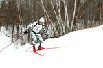 Vermont Army Guard 2nd Lt. Samuel Morse, winner of the 10-km sprint race two days earlier, climbs a hill during the final lap of the 20-km race March 12 at the 2008 Chief of the National Guard Bureau Biathlon Championships held at Camp Ripley, Minn., March 9-15. Morse finished second to his Vermont teammate Sgt. Jesse Downs, who won in 1 hour, 1 minute, 12 seconds.