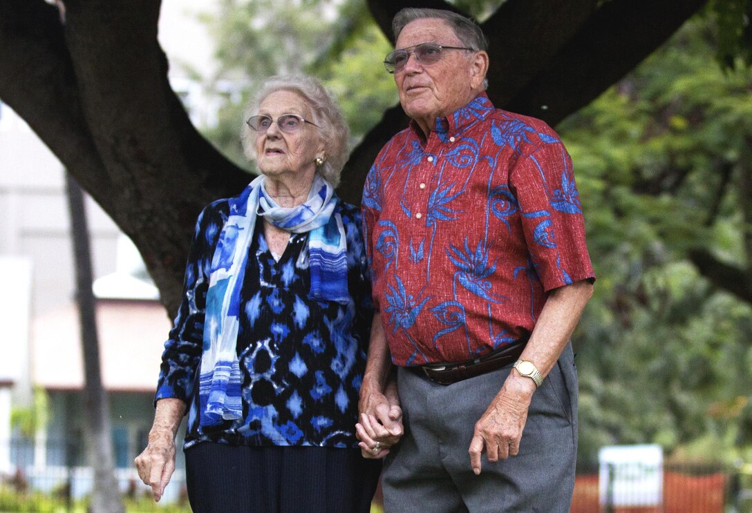 HONOLULU - Walter and Myrtle Powers hold hands as they look at the mountains in the distance outside the chapel they both attend every Sunday for church in Honolulu, March 30. The couple served in World War II from 1943-45 and got married after they were discharged, resulting in a 66-year marriage. (U.S. Marine Corps photo by Lance Cpl. Matthew Bragg) 
