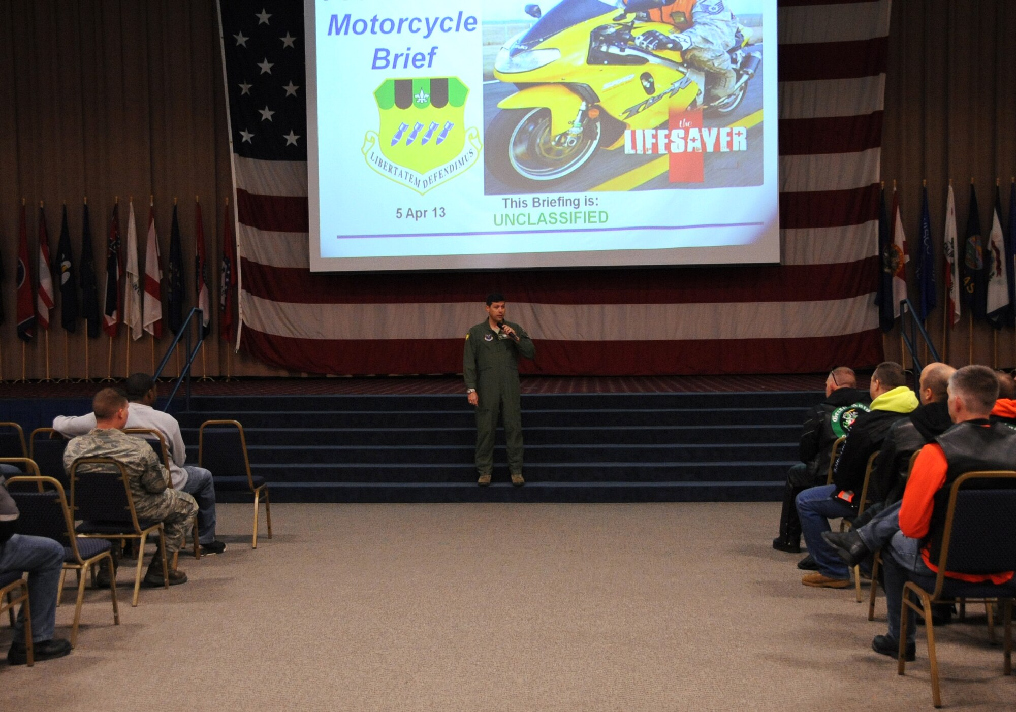 Col. Andrew Gebara, 2nd Bomb Wing commander, briefs motorcycle enthusiasts on motorcycle safety during the Thunder on the Bayou safety event on Barksdale Air Force Base, La., April 5, 2013. Barksdale currently has more than 600 motorcycle riders. (U.S. Air Force photo/Airman 1st Class Benjamin Gonsier)