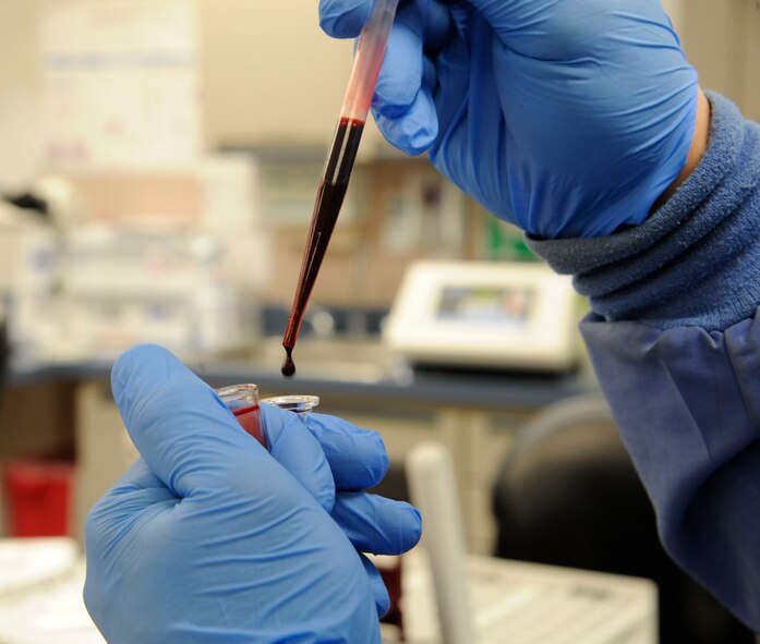 Senior Airman David Eley, 2nd Medical Support Squadron Medical Laboratory lab technician, prepares blood samples for blood sugar tests on Barksdale Air Force Base, La., April 5, 2013. The test was to determine the patient's diet and whether or not they were diabetic. (U.S. Air Force photo/Airman 1st Class Andrew Moua)