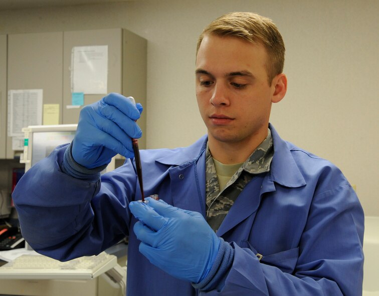 Senior Airman David Eley, 2nd Medical Support Squadron Medical Laboratory lab technician, prepares blood samples for blood sugar tests on Barksdale Air Force Base, La., April 5, 2013. The test determines the patient's diet and whether or not they are diabetic. (U.S. Air Force photo/Airman 1st Class Andrew Moua)