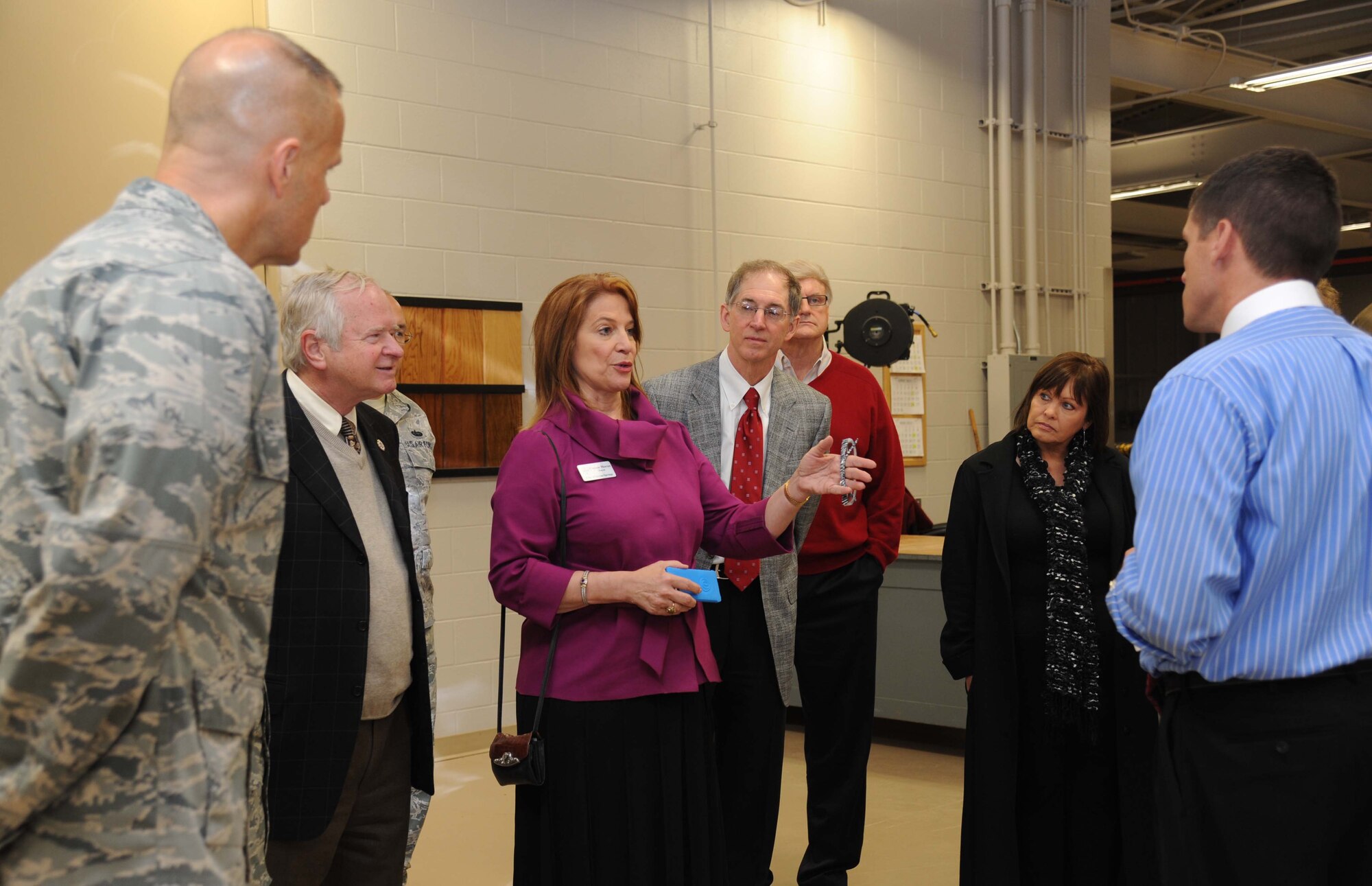 Ocean Springs Mayor Connie Moran asks questions about the training equipment made at the trainer development center during an honorary commanders tour April 5, 2013, at Keesler Air Force Base, Miss.  The Keesler Honorary Commanders Program informs selected non-federal elected officials, chamber of commerce members and other civic leaders about the missions of Keesler and the Air Force and fosters positive relationships with the base’s community partners.  This visit focused on the mission of the 81st Training Group.  (U.S. Air Force photo by Kemberly Groue)