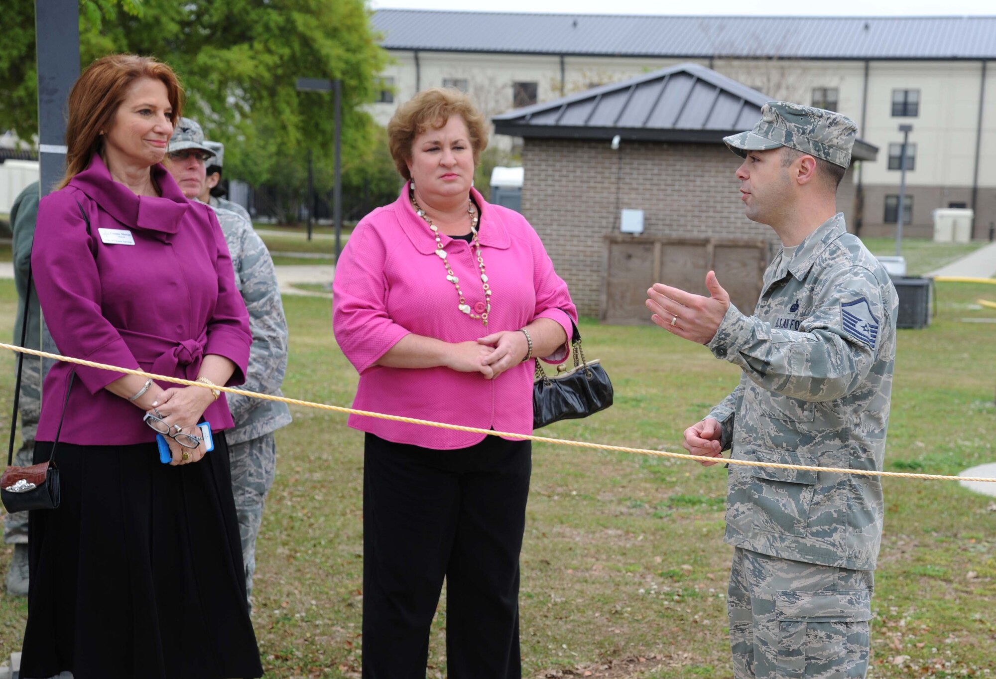 Ocean Springs Mayor Connie Moran and Adele Lyons, Habitat for Humanity for the Mississippi Gulf Coast director of development, receive a briefing from Master Sgt. Anthony Barattini, 338th Training Squadron, on the air expeditionary force area in the Triangle training area during an honorary commanders tour April 5, 2013, at Keesler Air Force Base, Miss.  The Keesler Honorary Commanders Program informs selected non-federal elected officials, chamber of commerce members and other civic leaders about the missions of Keesler and the Air Force and fosters positive relationships with the base’s community partners.  This visit focused on the mission of the 81st Training Group.  (U.S. Air Force photo by Kemberly Groue)