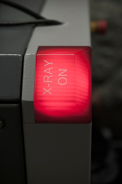 An X-ray machine is used as part of training for the 7th Logistics Readiness Squadron March 27, 2013, at Dyess Air Force Base, Texas. The Transportation Security Administration, or TSA, trained 7th LRS Airmen on how to properly process passengers, cargo and how to identify if a threat is present. (U.S. Air Force photo by Airman 1st Class Jonathan Stefanko/ Released)