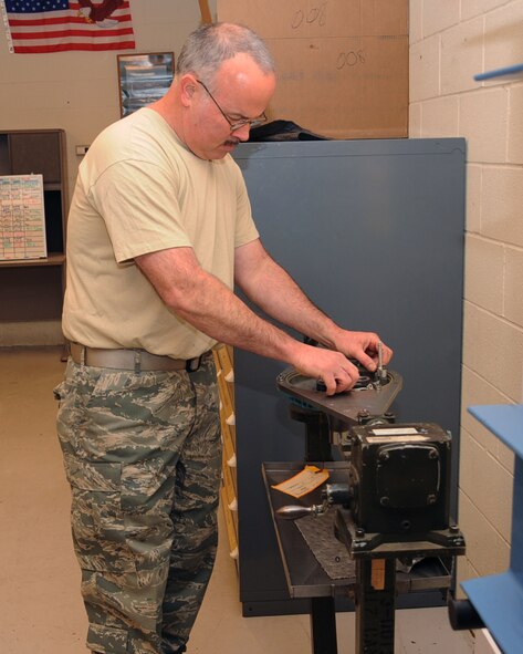 Tech. Sgt. David Marshall, 917th Maintenance Squadron jet engine mechanic, works on an auxiliary power unit of an A-10 Thunderbolt II on Barksdale Air Force Base, La., April 5, 2013. The unit is used to start the A-10 and provide ground crews with electrical power when being serviced. (U.S. Air Force photo/Senior Airman Sean Martin)