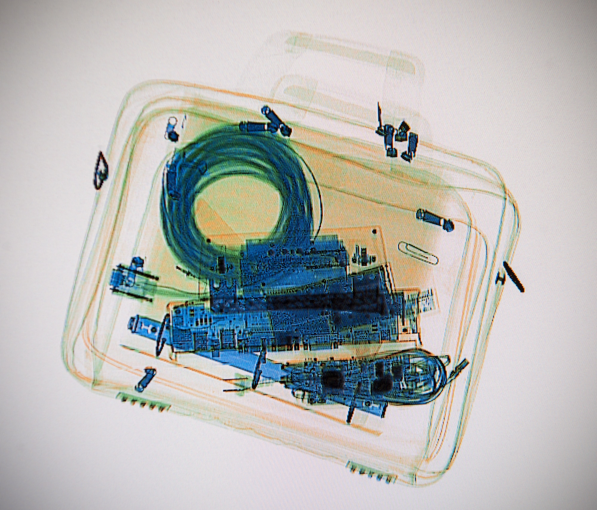 A briefcase is scanned through an X-ray machine as part of training for the 7th Logistics Readiness Squadron March 27, 2013, at Dyess Air Force Base, Texas. The Transportation Security Administration, or TSA, trained 7th LRS Airmen on how to properly process passengers, cargo and how to identify if a threat is present. (U.S. Air Force photo by Airman 1st Class Jonathan Stefanko/ Released) 