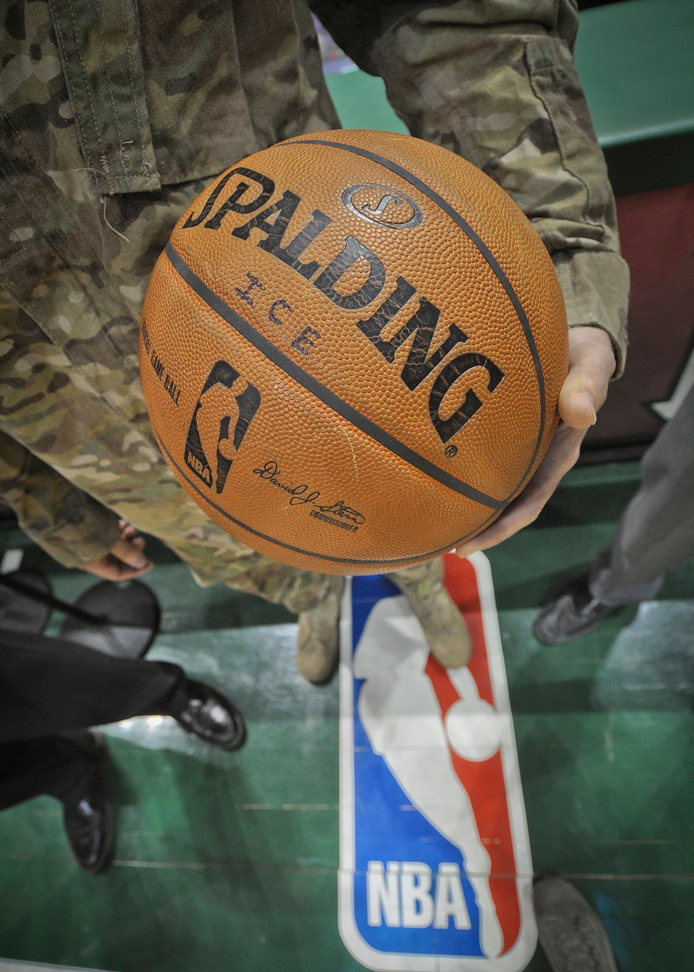 “Ice,” the official game ball for the Milwaukee Bucks game against the Minnesota Timberwolves.
SrA Jefferson Harkleroad presented “Ice” to the Bucks team captain Monta Ellis at center court as part of their “Hardwood Homecoming” program Wed., April 3, 2013 at the BMO Harris Bradley Center in Milwaukee.  
Harkleroad, an Air Force electrician serving in the Civil Engineering Squadron at Milwaukee’s 128th Air Refueling Wing, returned from a deployment in Afghanistan and was recognized by the crowd prior to the game. (Air National Guard Photo by 1st Lt. Nathan Wallin / Released)