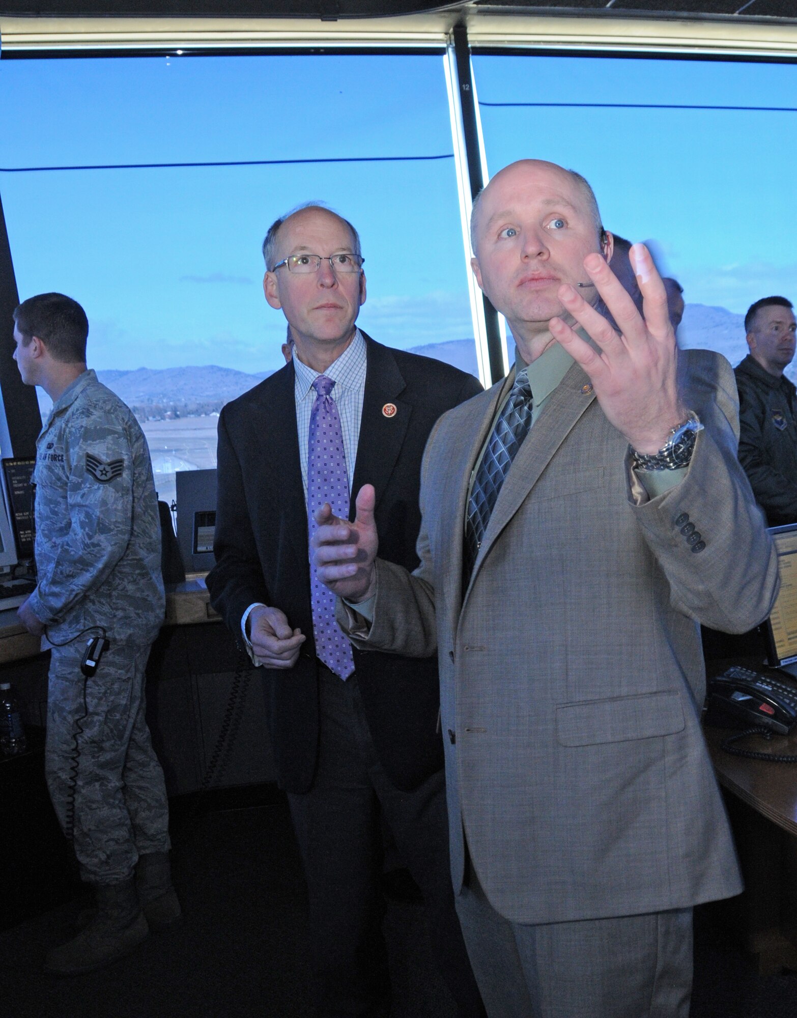 Congressman Greg Walden (R-Ore.) gets briefing by Doug Cunningham a civilian air traffic controller at the Kingsley Field Air Traffic Control Tower. Walden visited the tower in the wake of proposed sequestration cuts threatening its eminent closure, March 22, 2013. During his tour of the tower 270th Air Traffic Control Squadron personnel learned the tower has been removed from the FAA’s closure list prompting Walden to applaud and cite the cost effectiveness of the tower and its role in national security. (Air National Guard photo by Tech. Sgt. Jefferson Thompson, 173rd Fighter Wing Public Affairs Office)