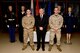 The Marine Corps Liaison Team stands in the Uniform Room of the Charles C. Carson Center for Mortuary Affairs, Dover Air Force Base, Del., April 2, 2013. From left to right are Marine Corps Staff Sgt. John Clements, Kevin Smith and Marine Corps Cpl. Landon Beaty. The specialized team coordinates the details associated with the return of fallen Marines. (U.S. Air Force photo/David Tucker)