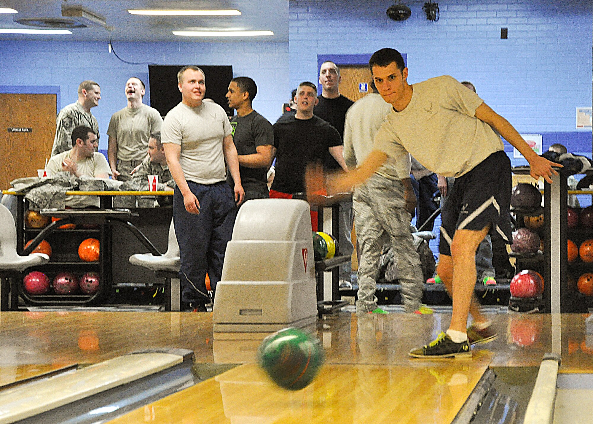 Senior Airman Matthew Garcia, 790th Security Forces Response Force leader, takes time during his lunch break to bowl and enjoy pizza with fellow Airmen March 29 in Warren Lanes to help raise money for the Company Grade Officers’ Council.

Throughout the year, the CGOC supports events like Operation Provide Joy, the wing holiday party, the Annual Awards Banquet, the Cowboy Shuttle and more. First Lt. Jessica Whitney, 90th Comptroller Squadron Financial Analysis Flight commander and CGOC treasurer, organized the fundraiser together with Warren Lanes staff.

This fundraising event helps support the base throughout the year, Whitney said.

“The goal is to get people out here, have some fun and raise money for the organization,” she added.

The CGOC filled the lanes and raised almost $200. Security Forces Airmen, Services Airmen and civilians alike came out to play and help raise money for the base.

“We have gotten a lot of support across the ranks on base,” Whitney said. “This event was really successful.” (U.S. Air Force photo by 2nd Lt. Christen Downing)